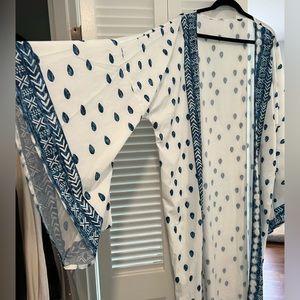 No Name White w/ Blue Kimono. One Size- runs Large. Really Beautiful sleeves.
